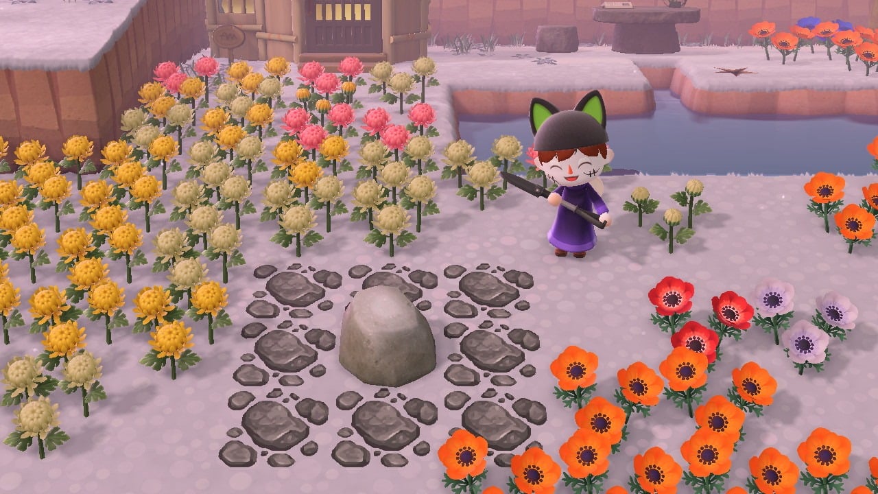 Jugador de Animal Crossing junto a una roca que no tiene malas hierbas, elementos o flores junto a la roca