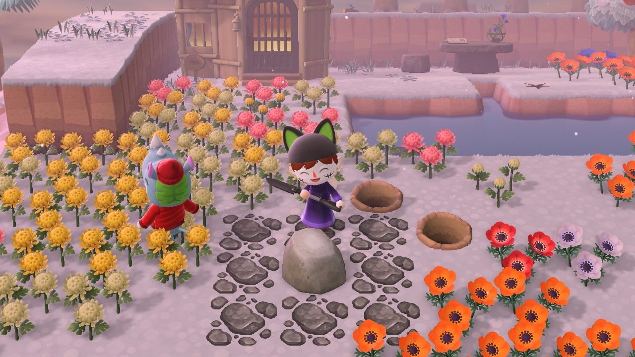 Animal crossing player next to a rock with 2 dug up holes.